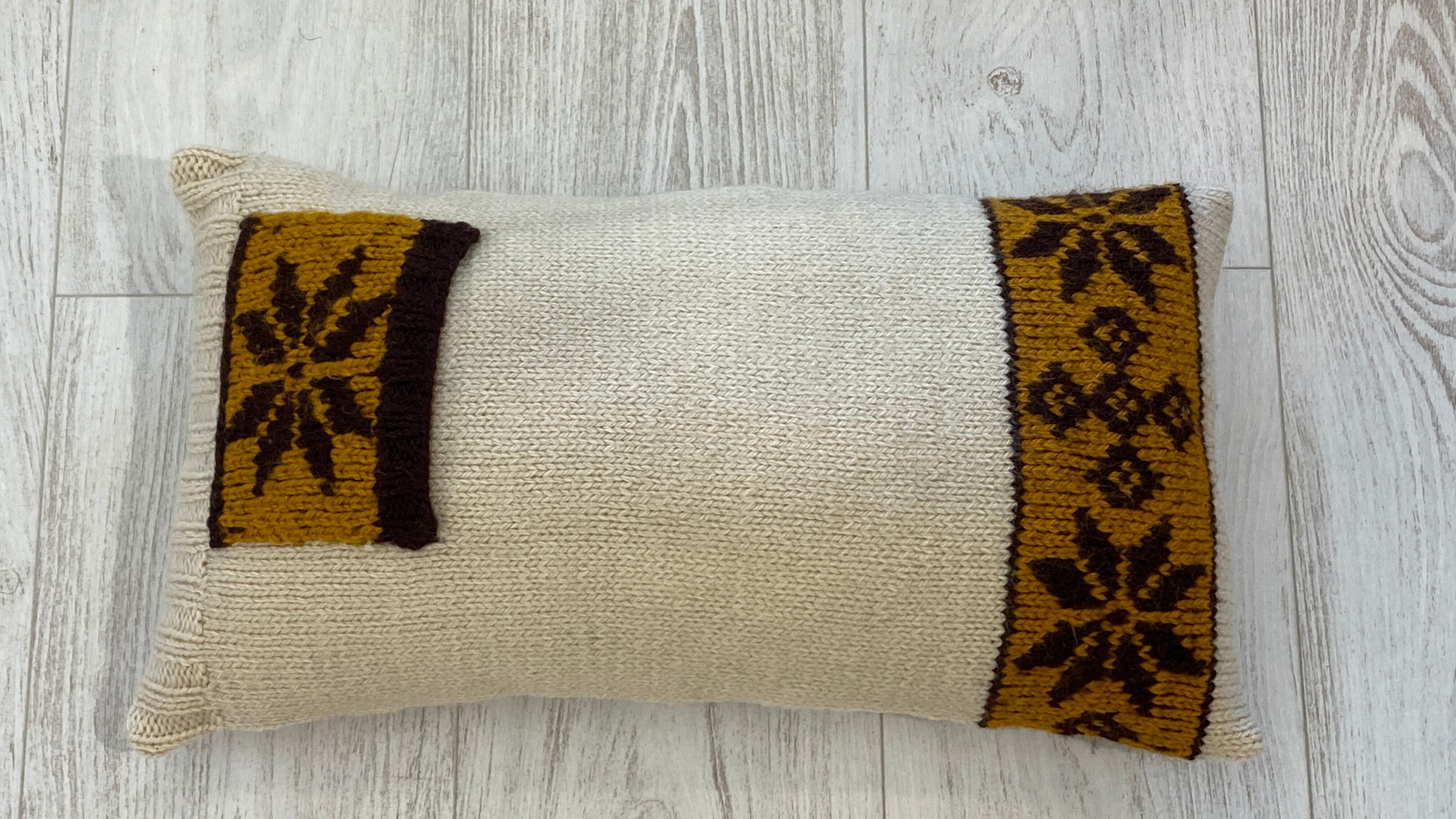 Pair of vintage retro wool knitted cushions