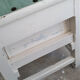 Wooden waxer's stool with drawer