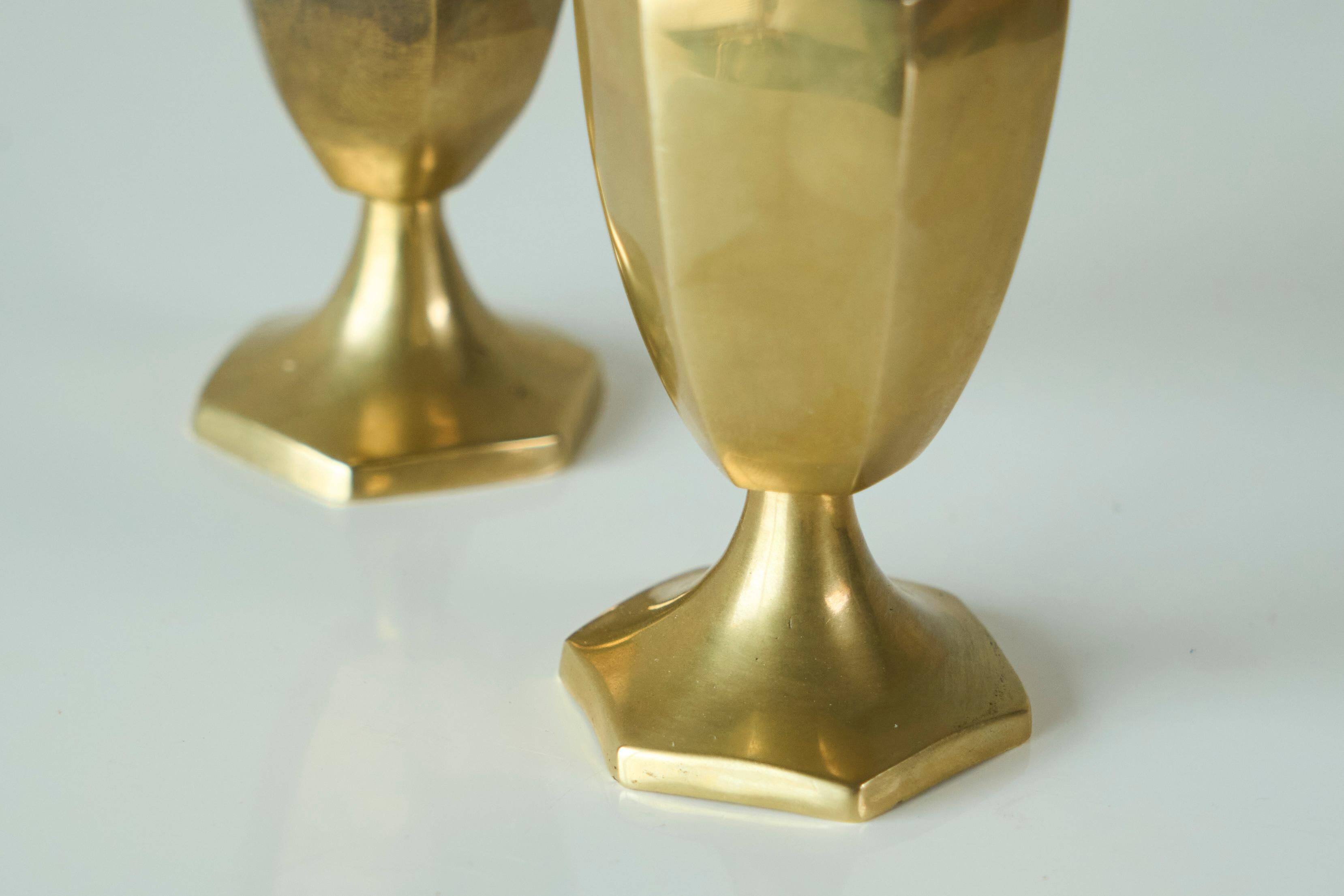 Pair of patinated brass salt and pepper shakers, 20th century.