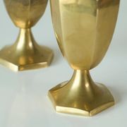 Pair of patinated brass salt and pepper shakers, 20th century.