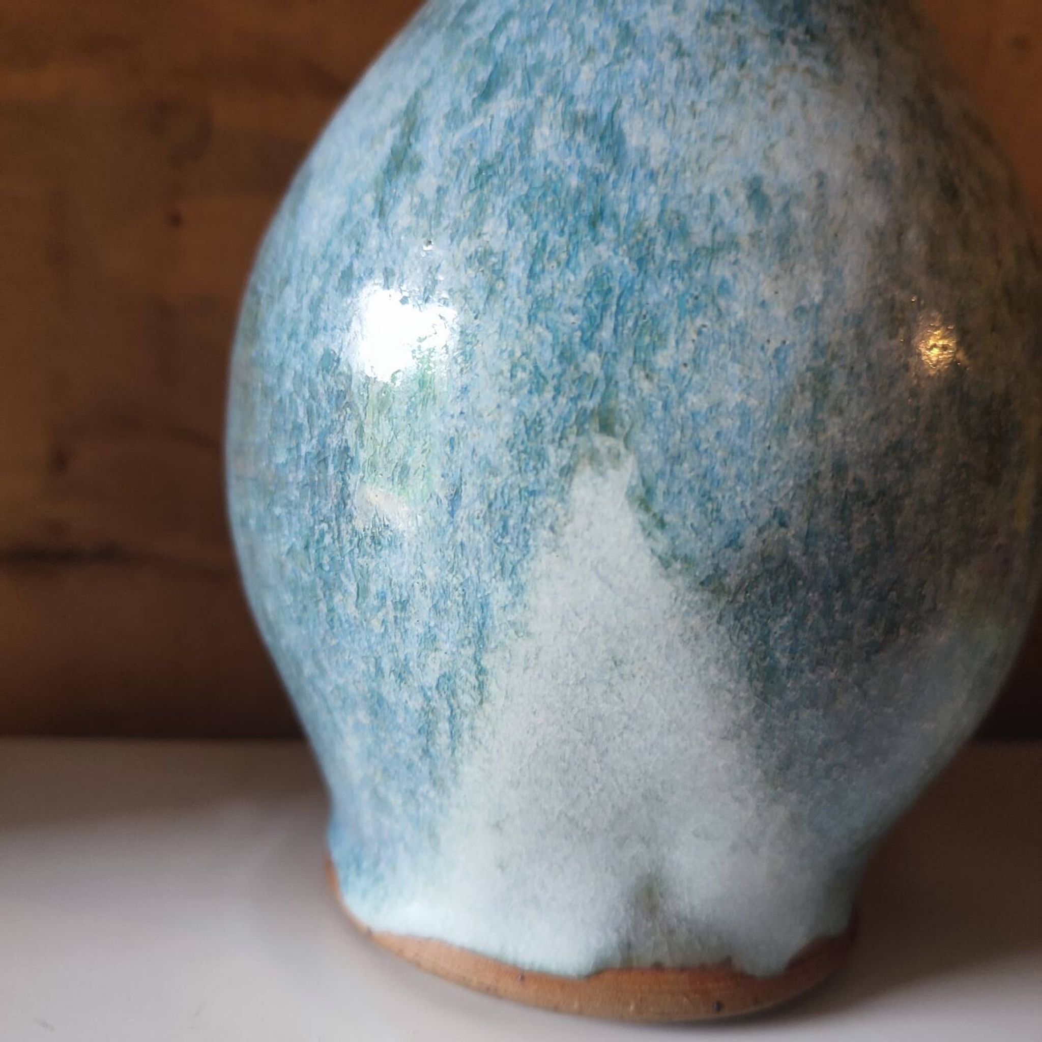 Blue crackle glaze stoneware pitcher