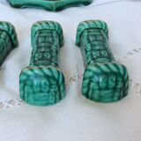 Set of 6 knife holders, a trivet, a 1960s bottle coaster