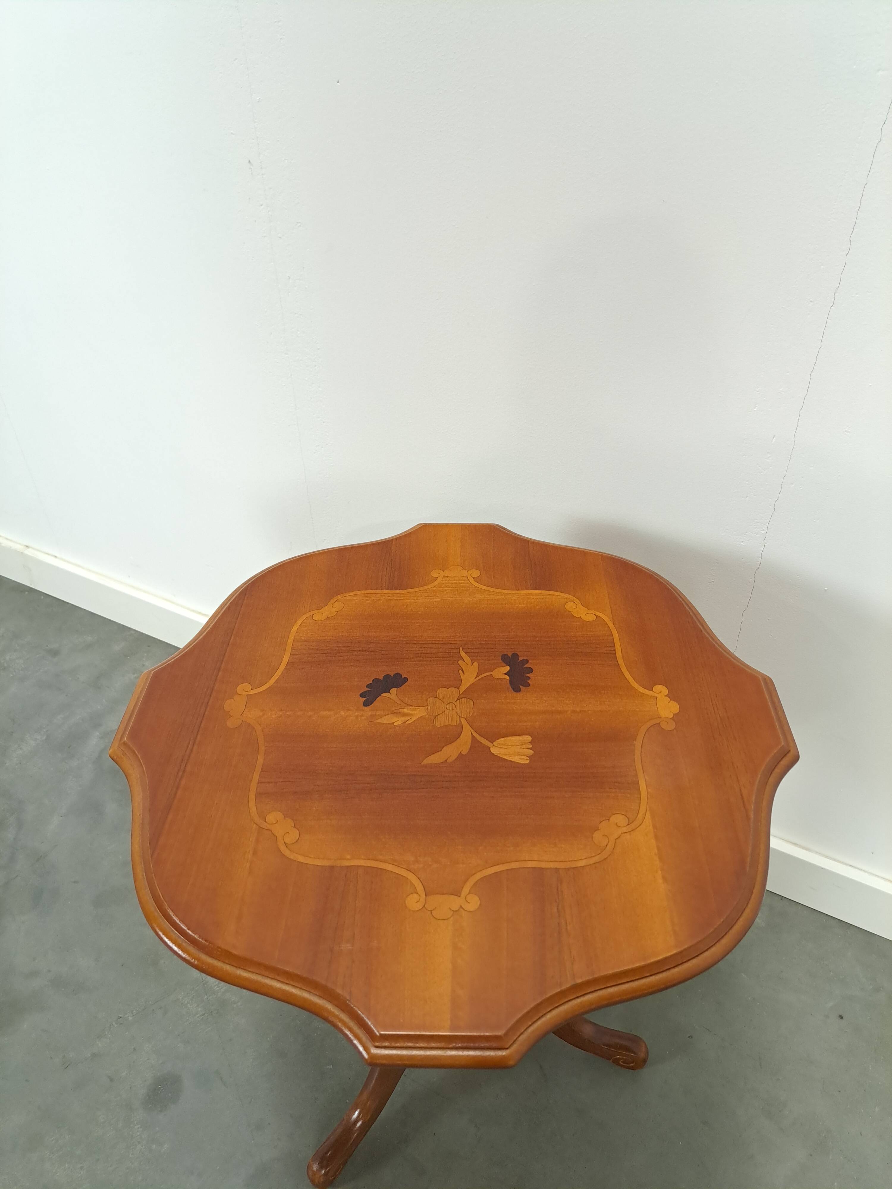 Round vintage wooden side table with inlaid veneer
