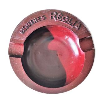 Ashtray advertising of reglia watches in bakelite