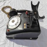 Telephone in black bakelite dial with call system