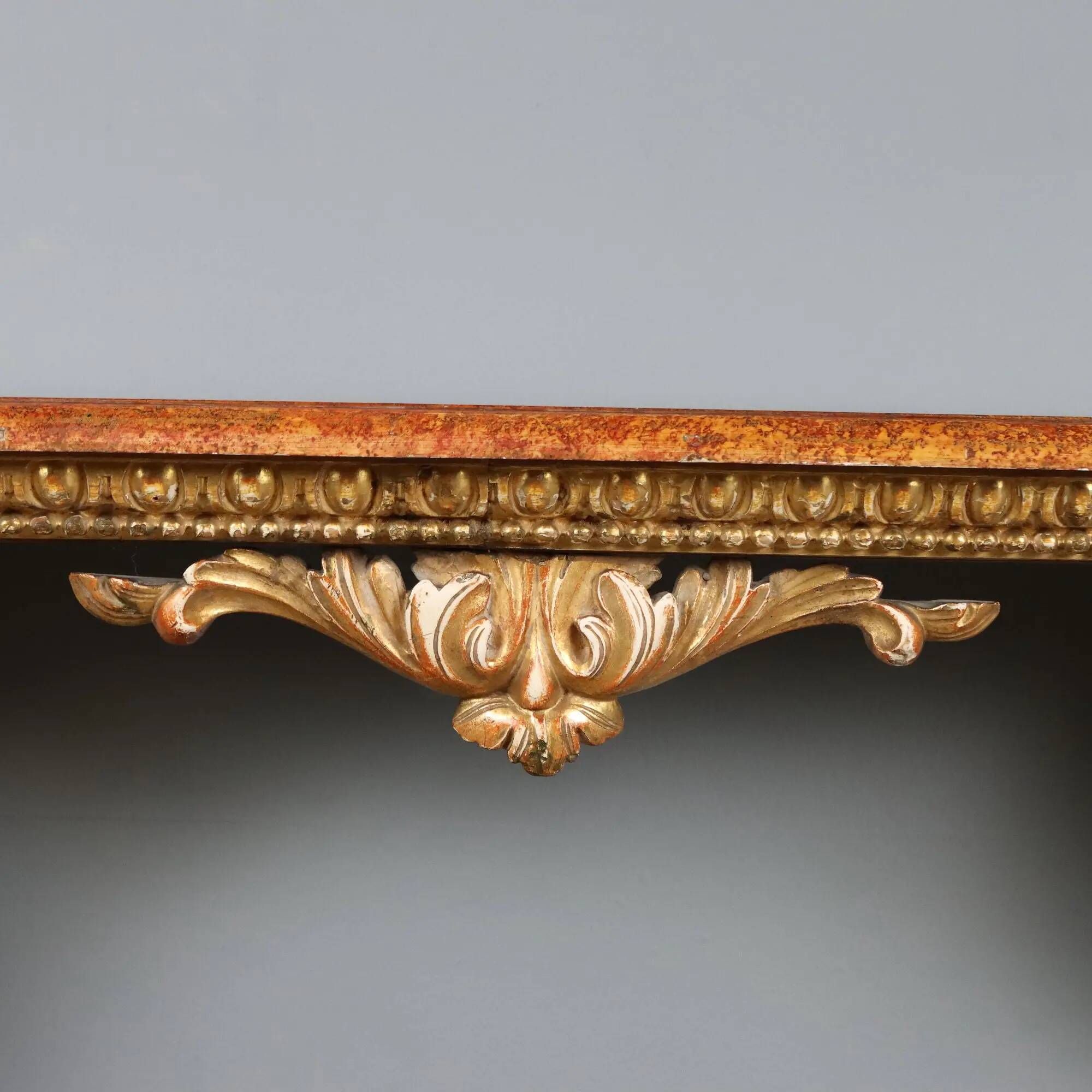 Old carved and gilded wooden console, Italy, 19th century.