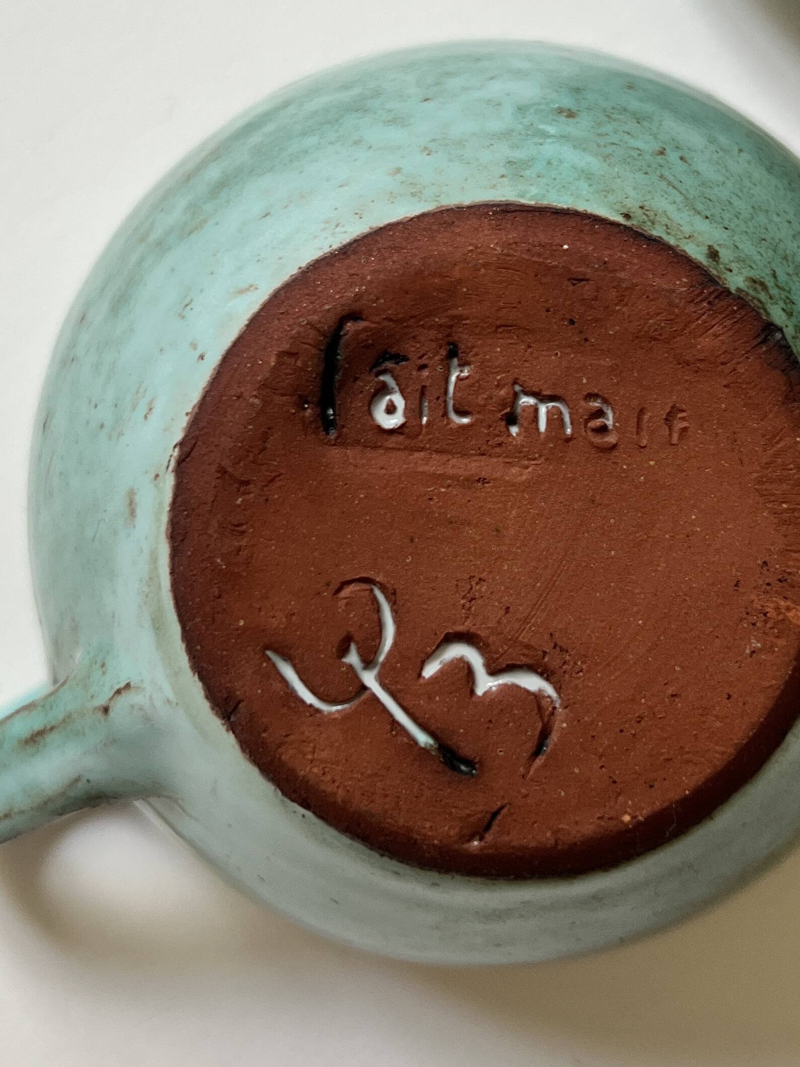 Handmade and signed glazed ceramic coffee cups, circa 1950.