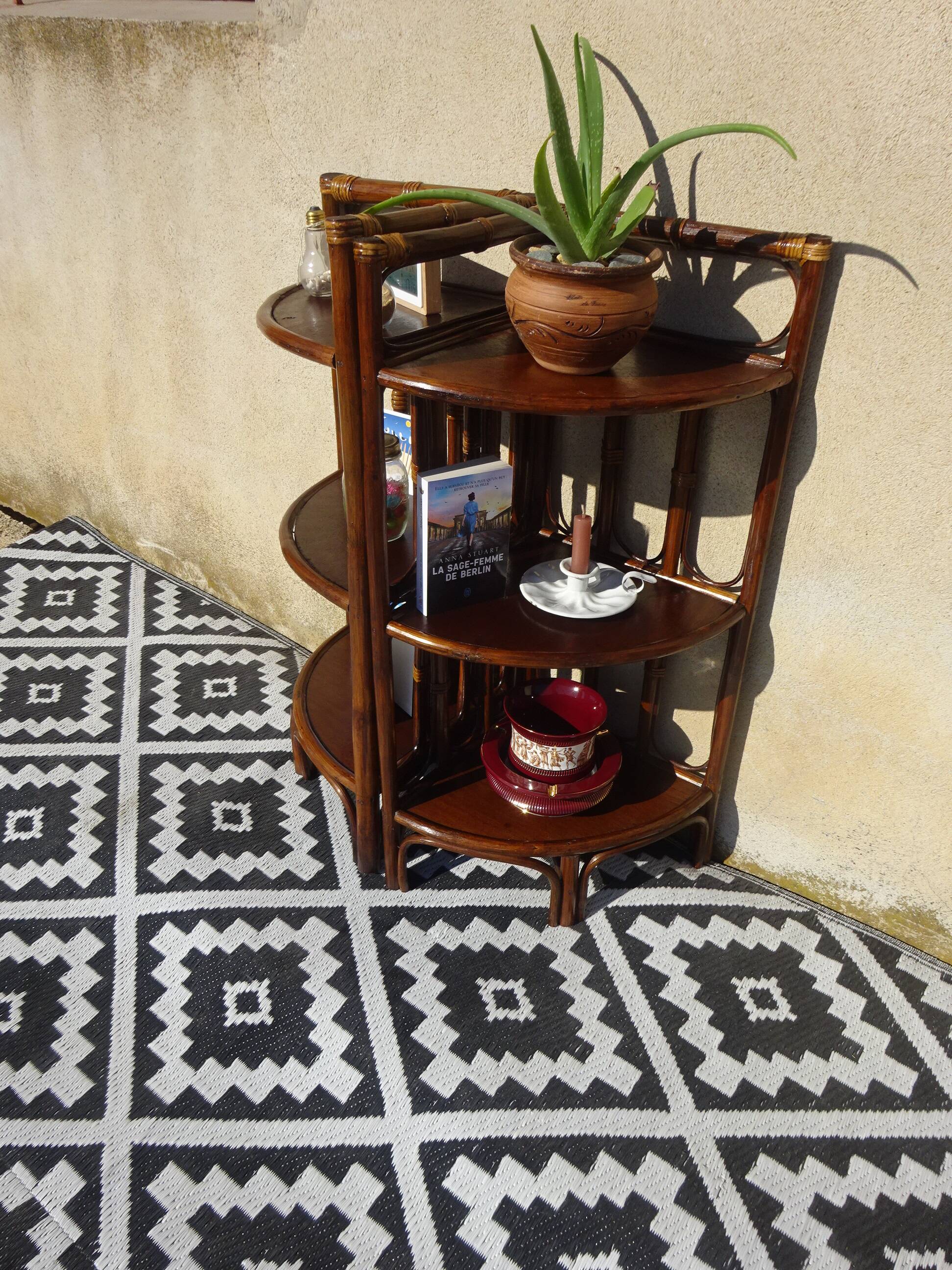 Rattan and bamboo bedside tables, both.