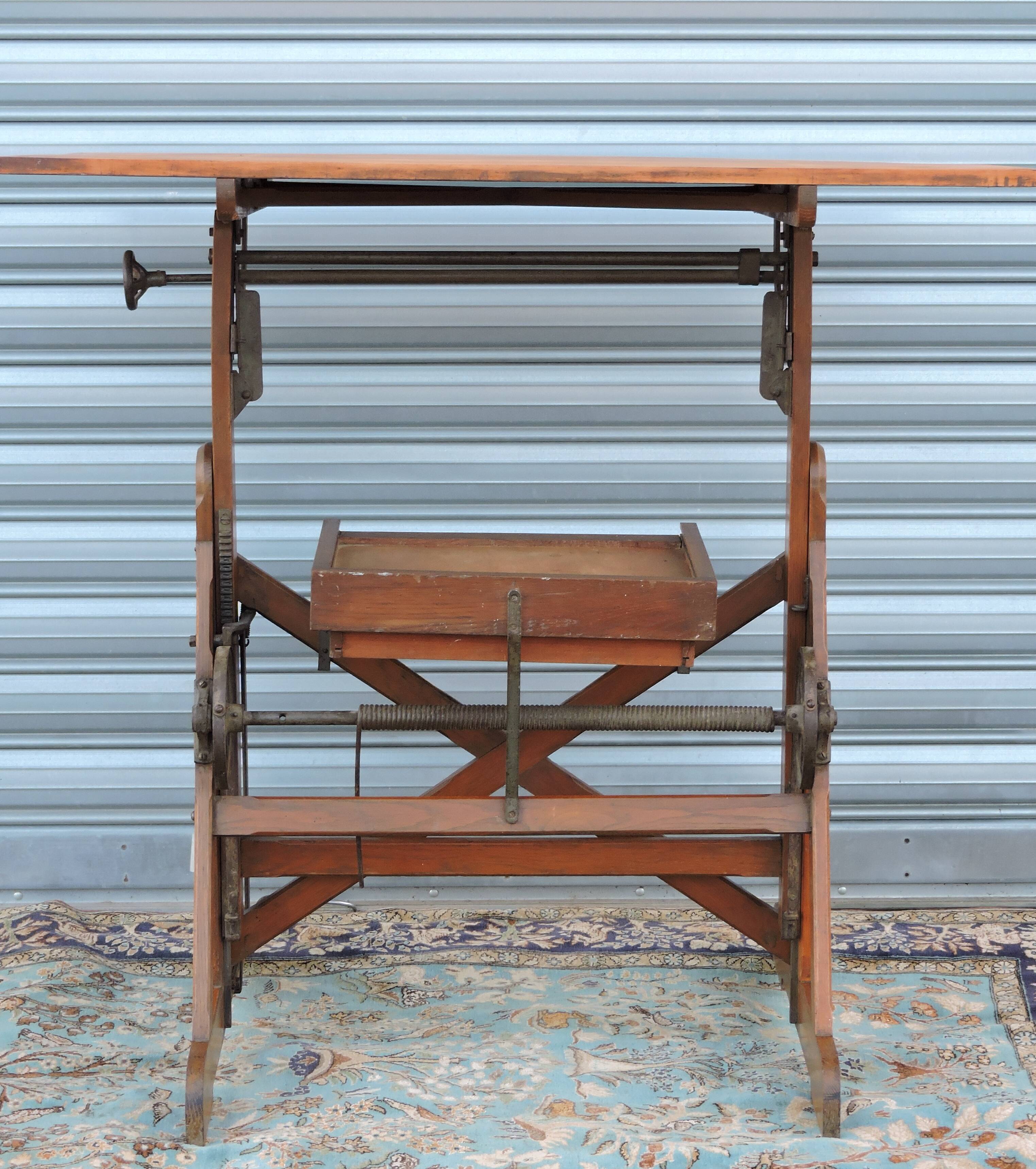 Architect's table has industrial adjustable design H Morin betting