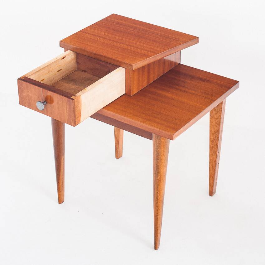 Vintage bedside table. Varnished wood. France, 1960s.