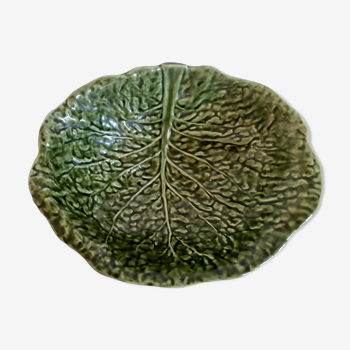 Dish in dabbling cabbage leaf