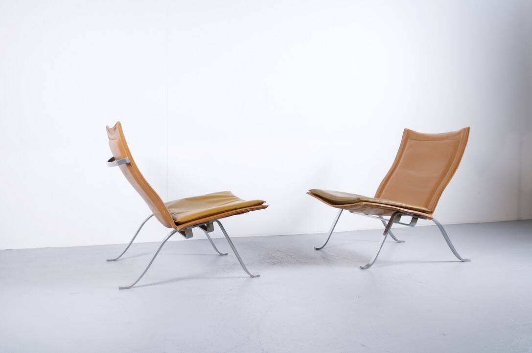 Imposing pair of leather and steel armchairs from the 1960s