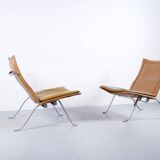 Imposante paire de fauteuils cuir et acier années 60'