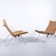 Imposing pair of leather and steel armchairs from the 1960s