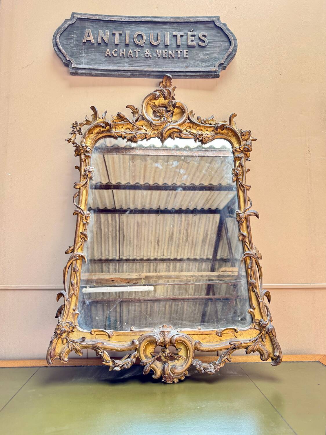 Louis XV period wooden and gilded stucco mirror, 18th century