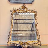 Louis XV period wooden and gilded stucco mirror, 18th century