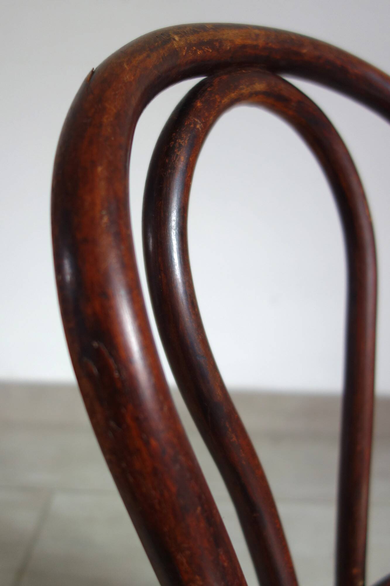 Antique curved wooden children's chair by Fischel, early 20th century.