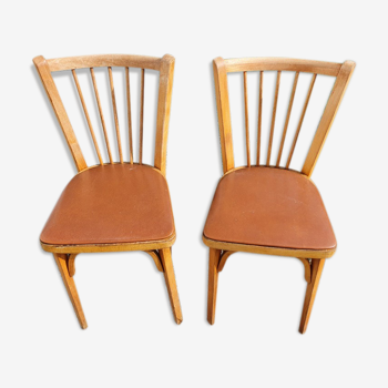 2 chaises estampillées Baumann n°12 assise marron
