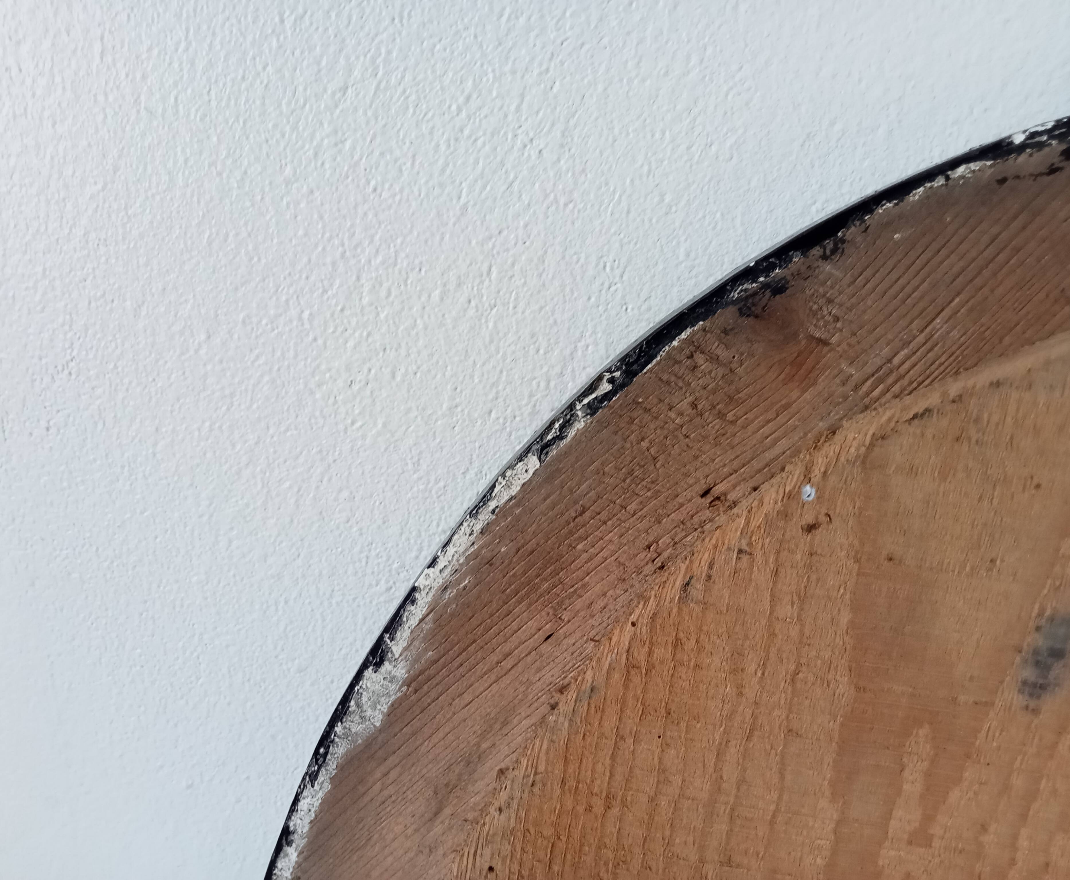 19th-century antique mirror in wood and stucco.