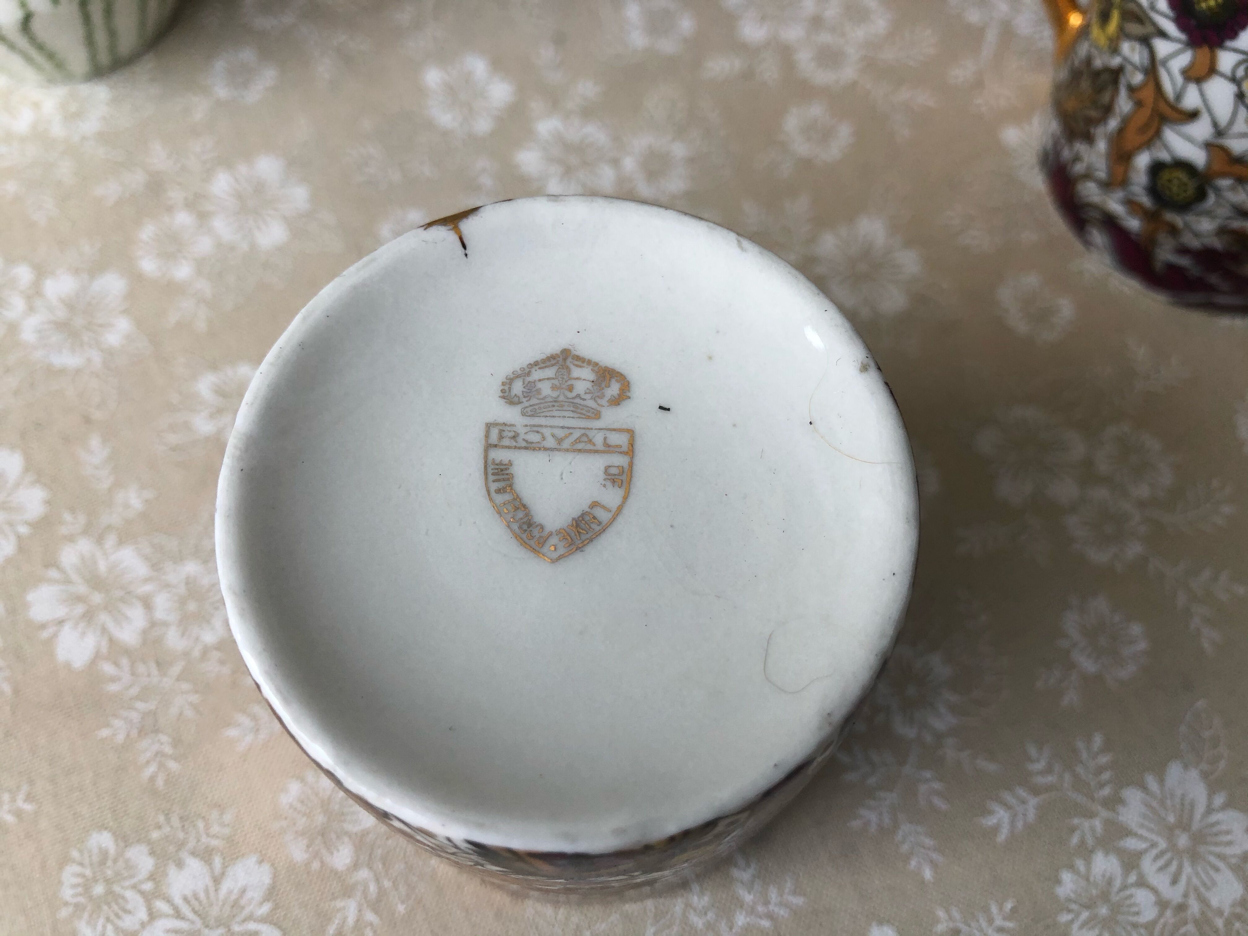 Royal porcelain coffee cups from Luxe inside copper gold cashmere pattern