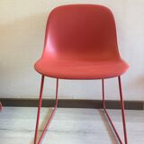 Red muuto "visu" chairs with sled base