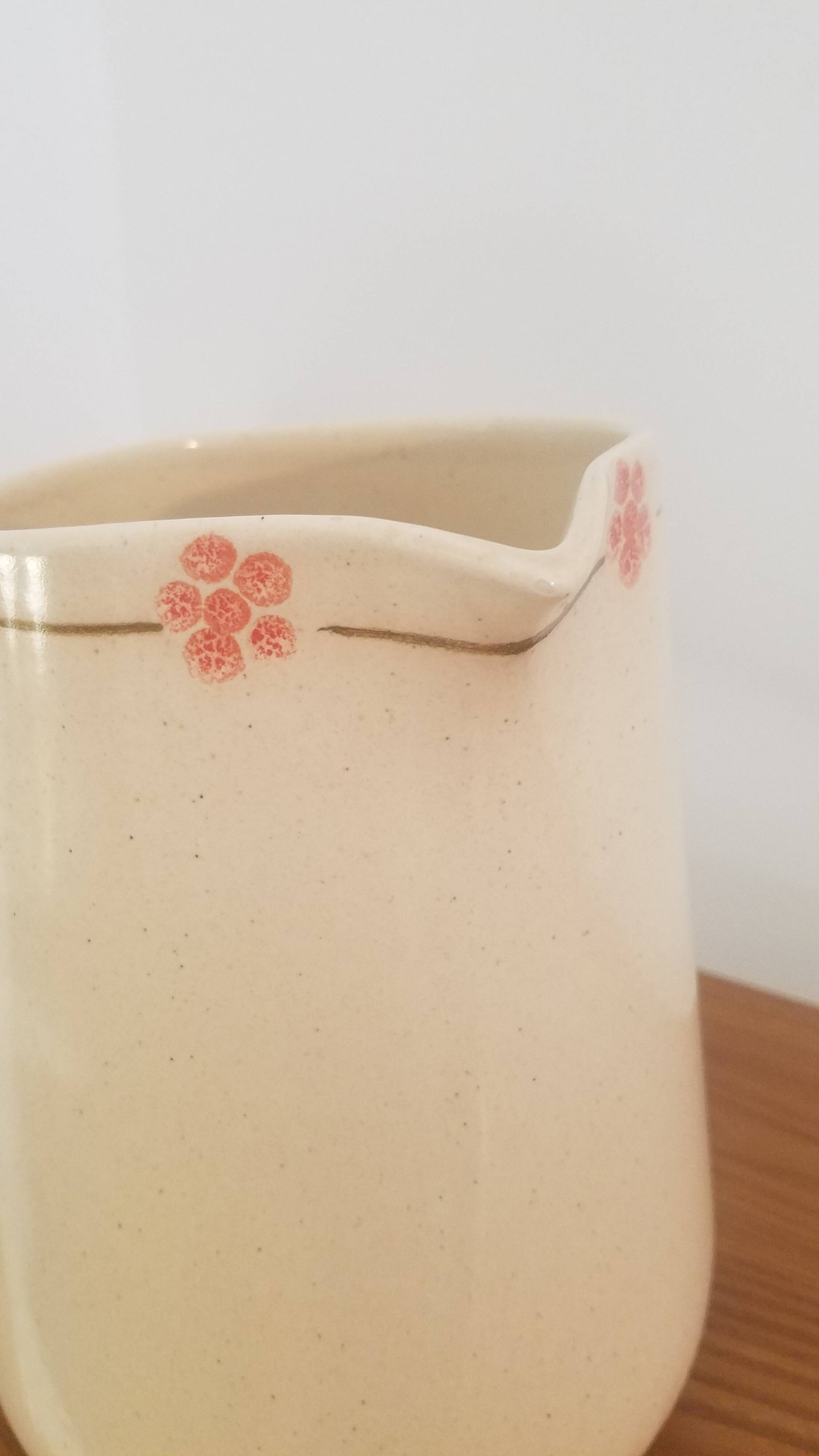 Hand-painted glazed ceramic pitcher