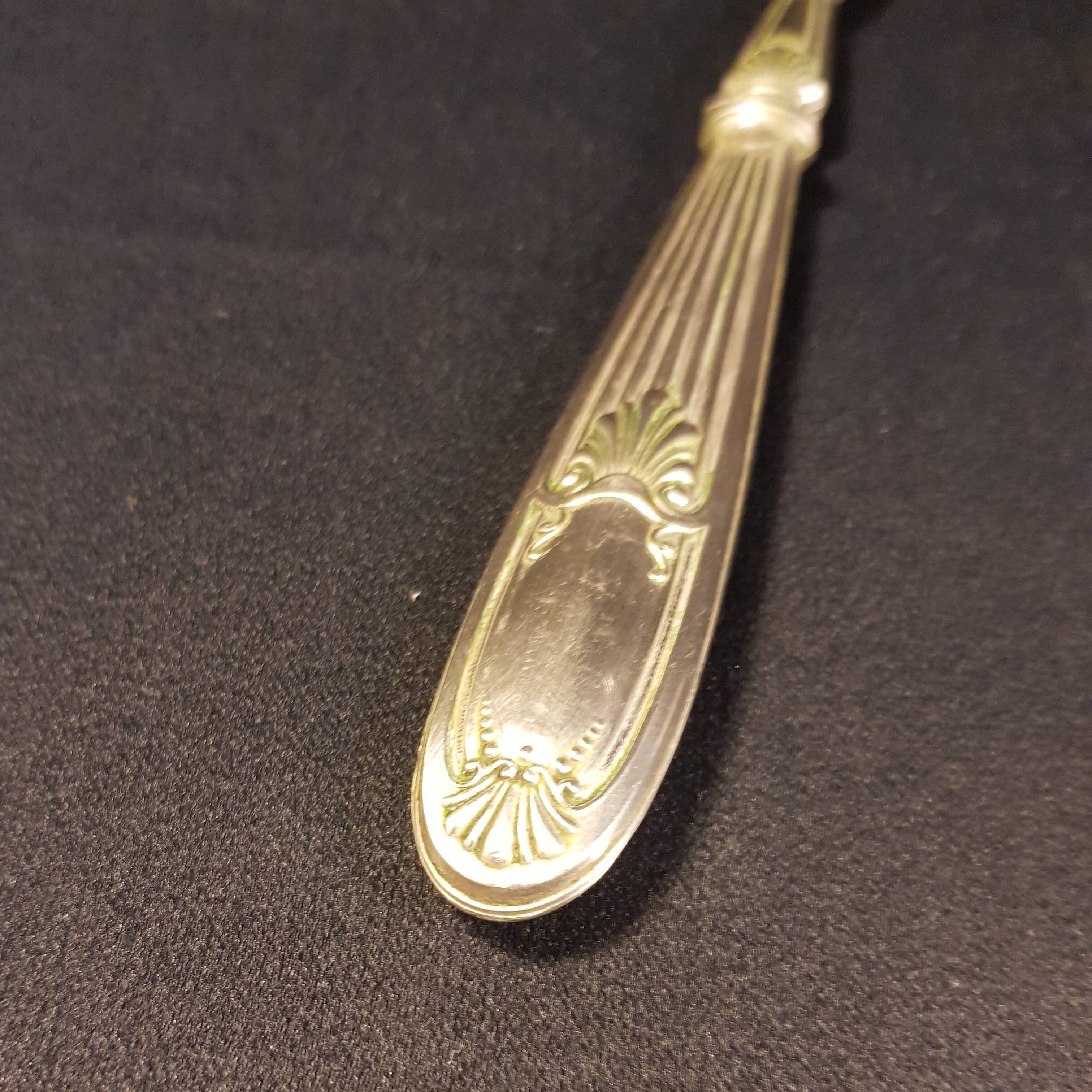 Old salad servers in their case