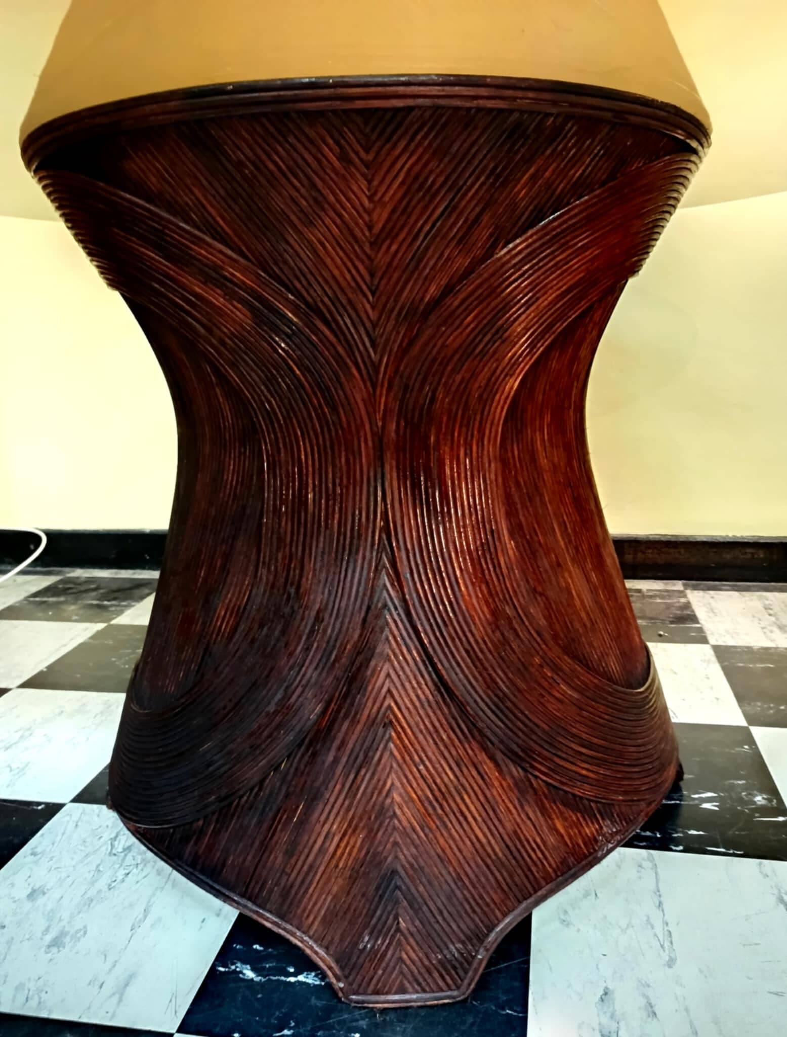 Dining table with rattan marquetry
