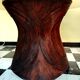 Dining table with rattan marquetry