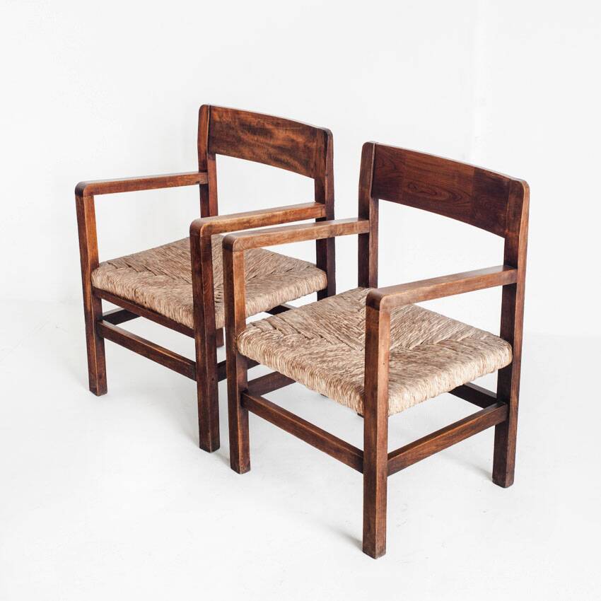 Pair of rustic armchairs in solid wood and straw seats. France, 1940s