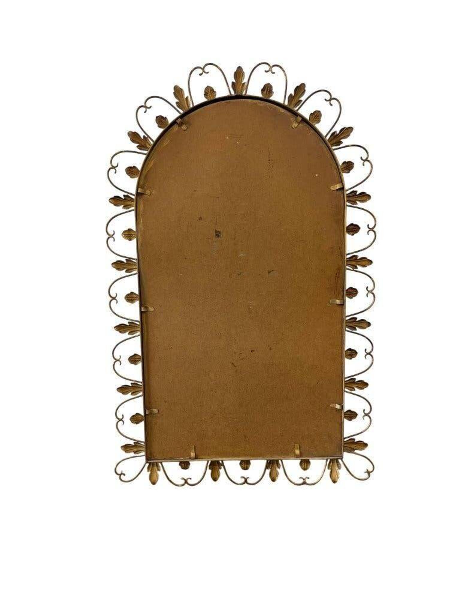 Vintage gold wall mirror with leaves