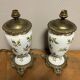 Old pair of porcelain oil lamps decorated circa 1900