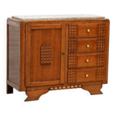 Cabinet Art Déco sculpté en chêne par Charles Dudouyt, France, années 1930.