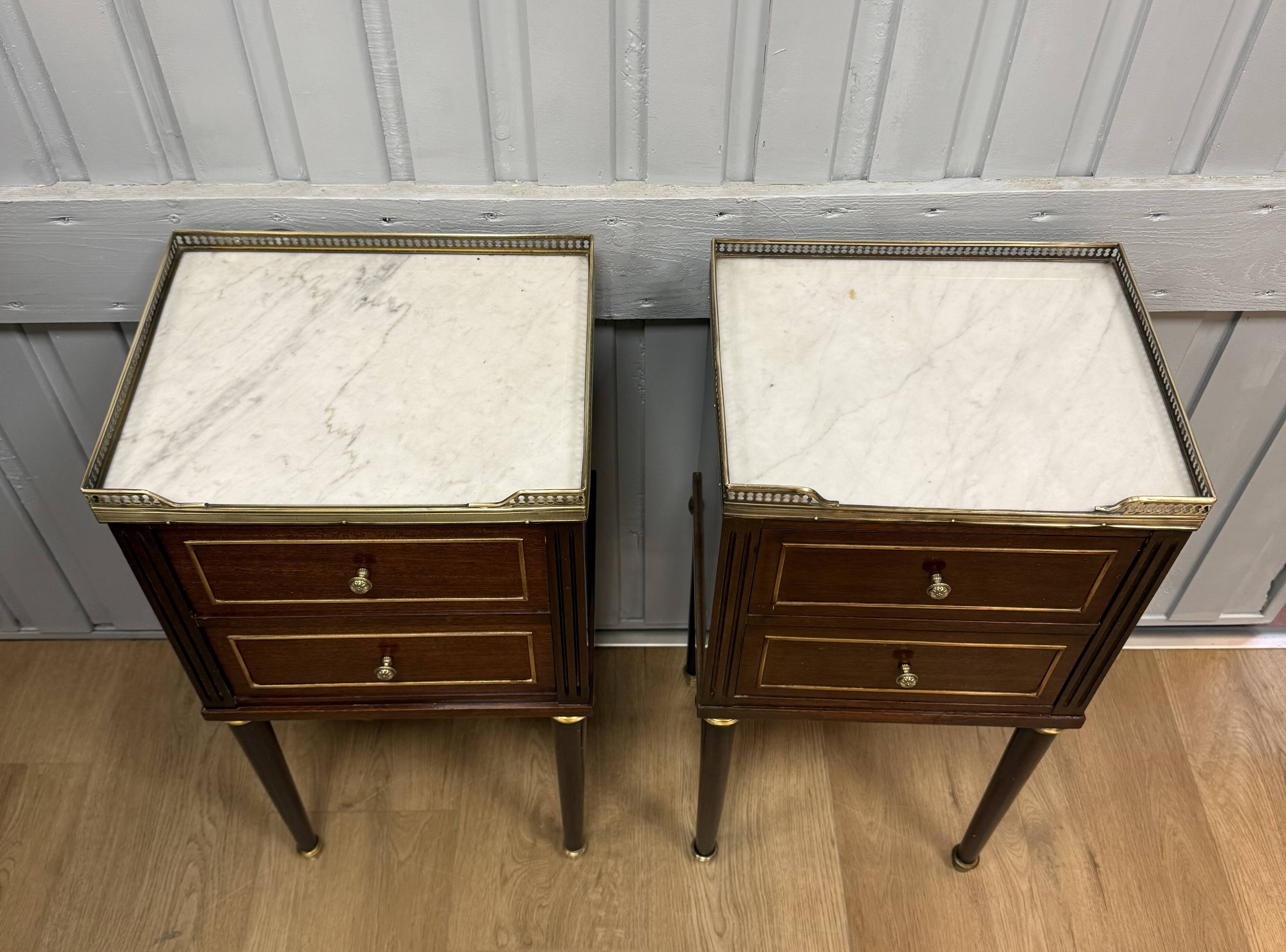 Pair of Louis XVI style bedside tables in mahogany