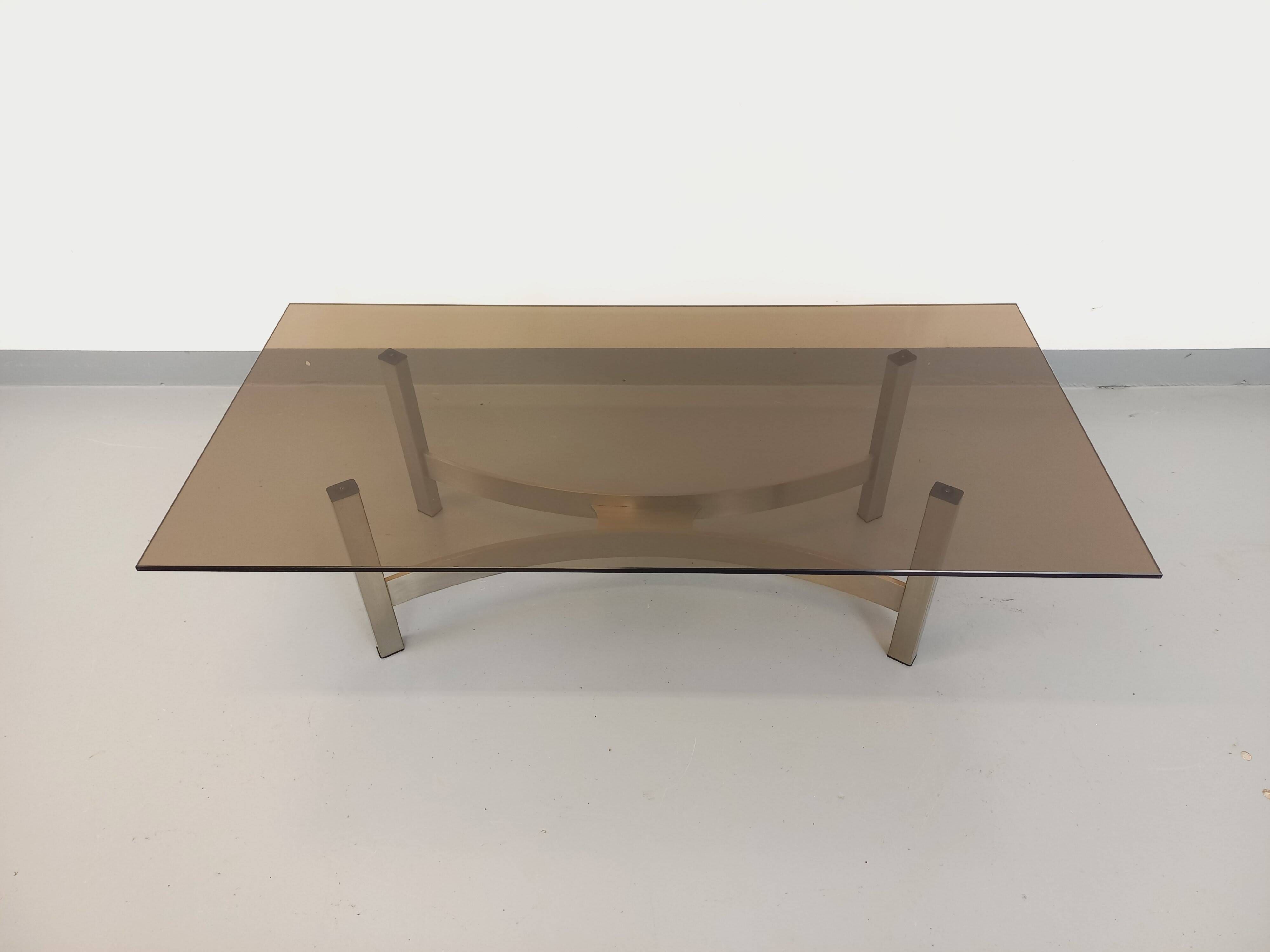 Vintage coffee table in smoked glass and brushed cast aluminum from the 70s