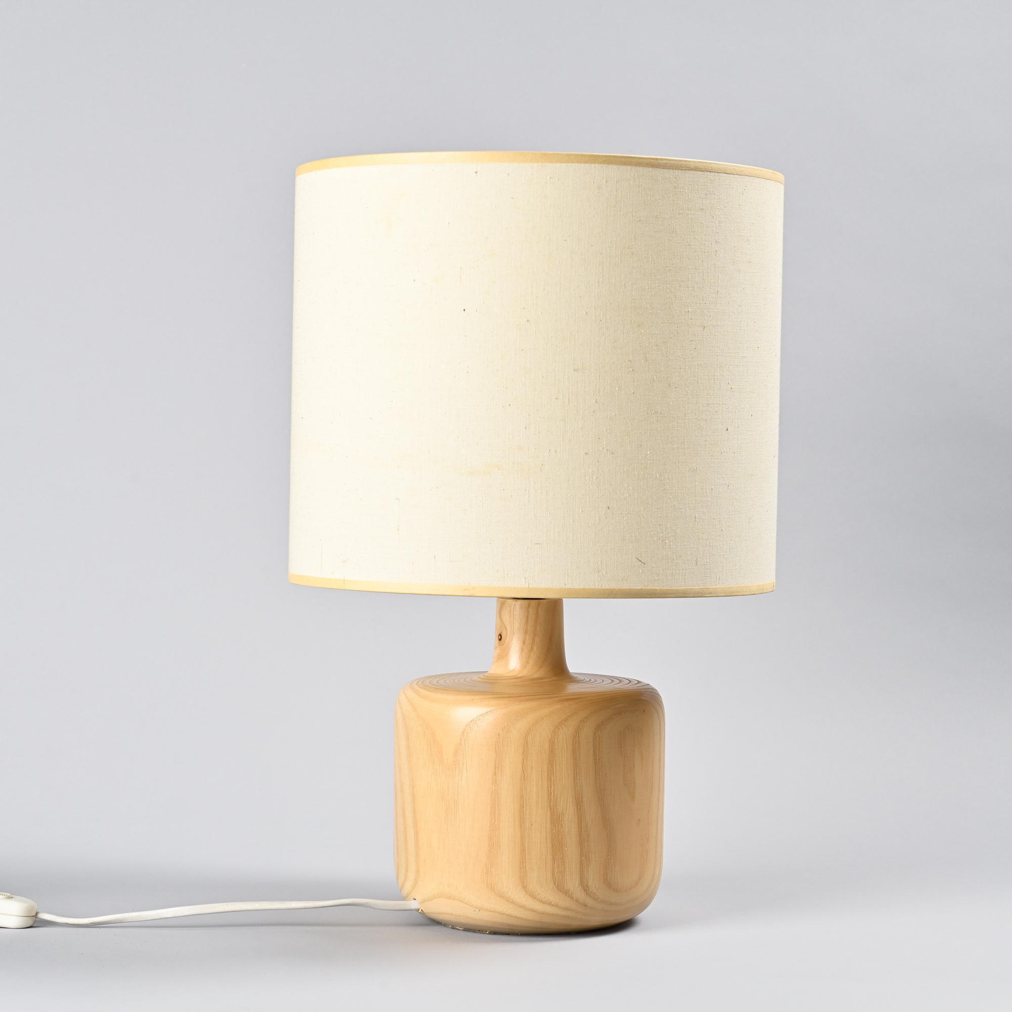 Table lamp in solid elm, France, circa 1970.