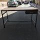 Metal desk on wood circa 1950