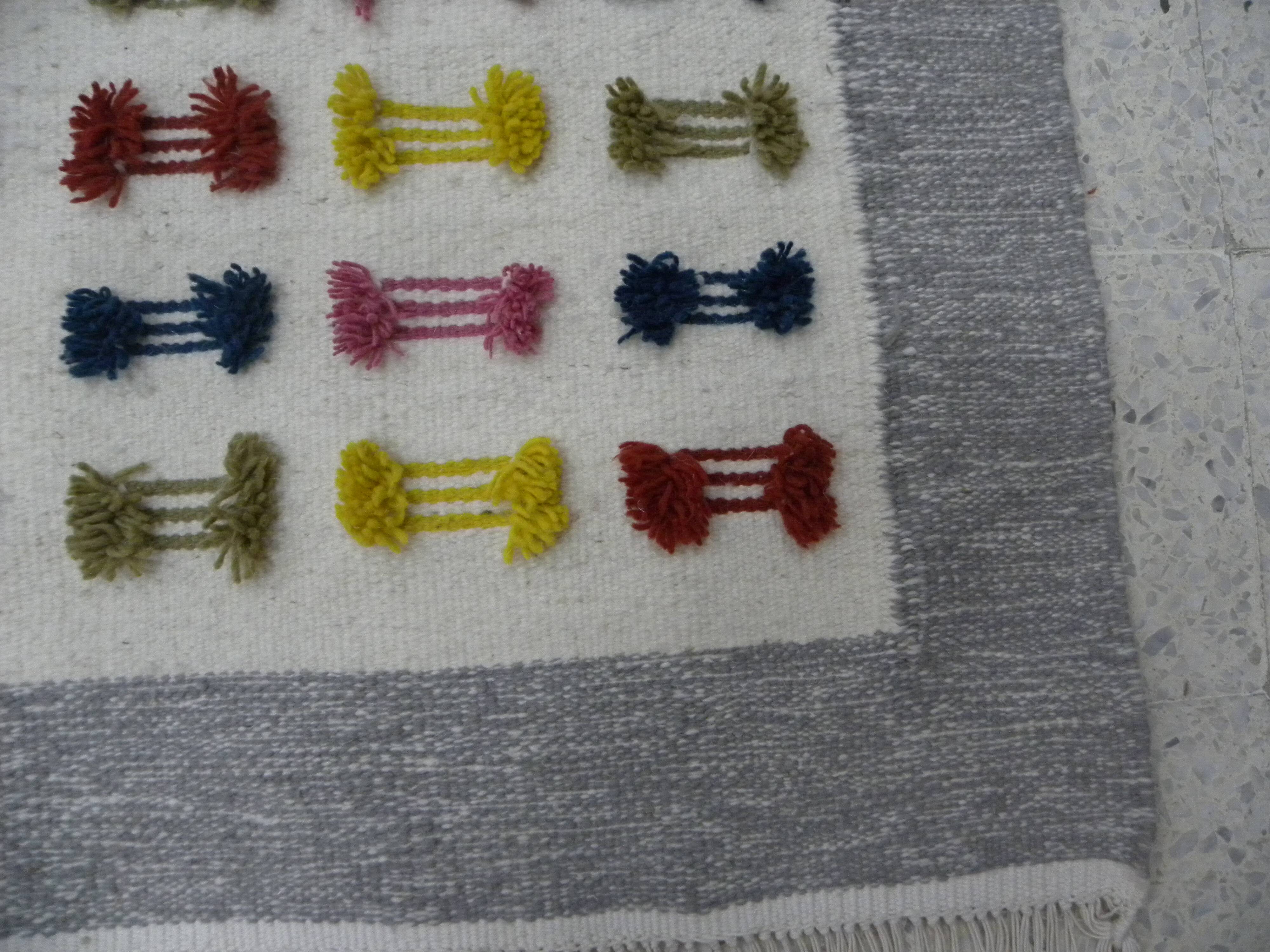 Handwoven Modern Boho Wool Rug with Colourful Patterns and Pompoms