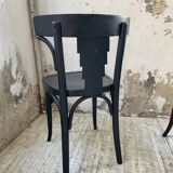 Set of 7 black bistro chairs