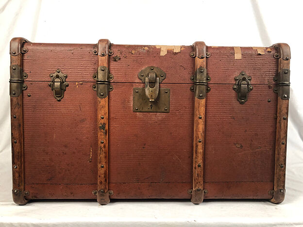 Old travel trunk cardboard, fabric and leather