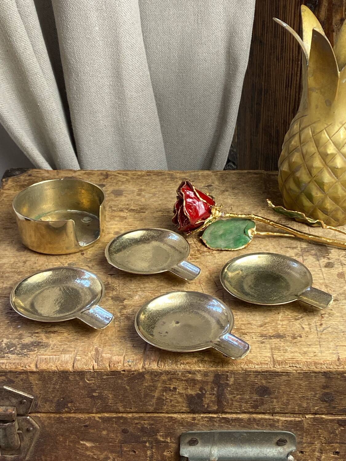 Individual brass ashtrays with storage support