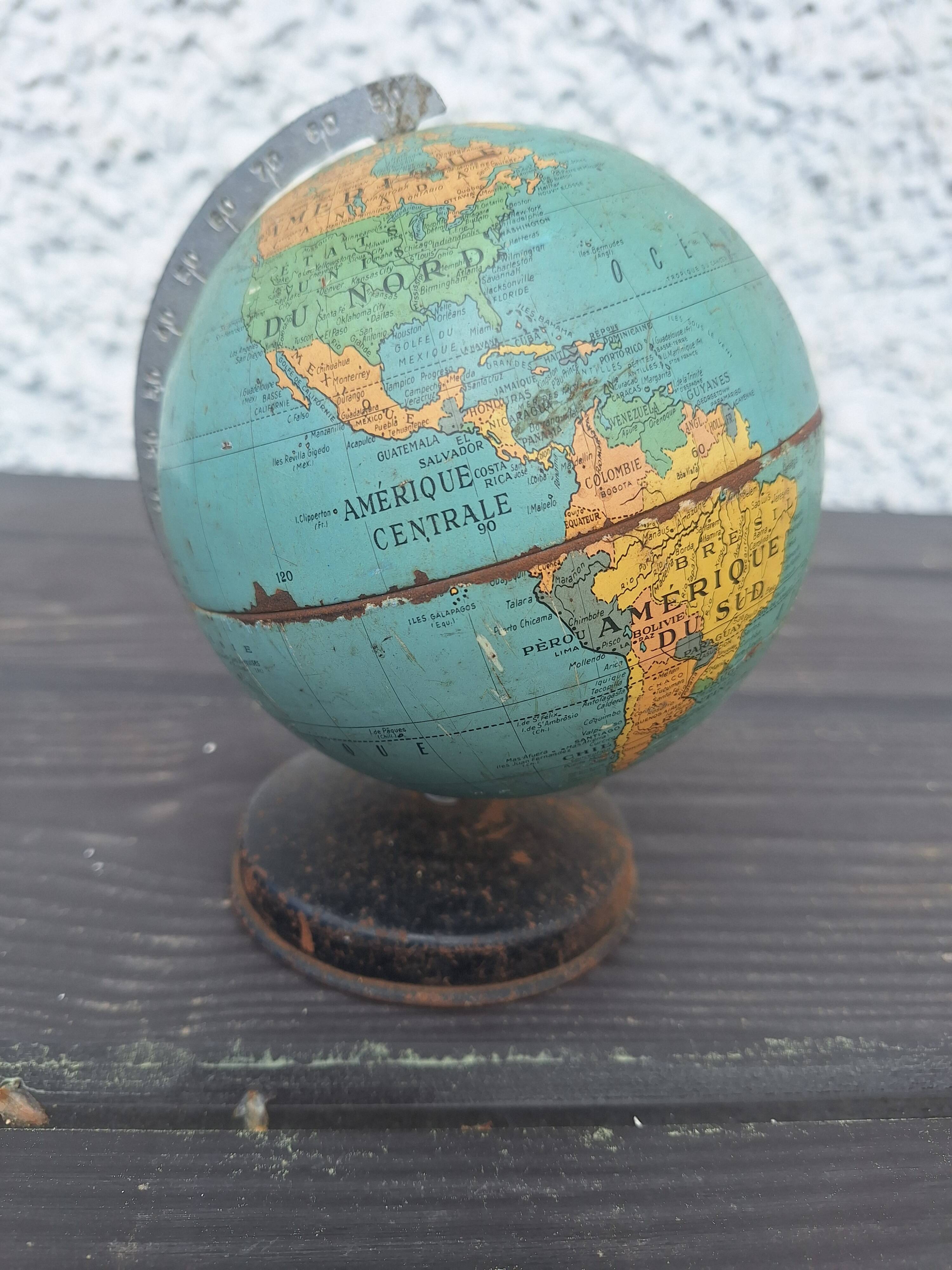 Old small metal globe "taride maps"