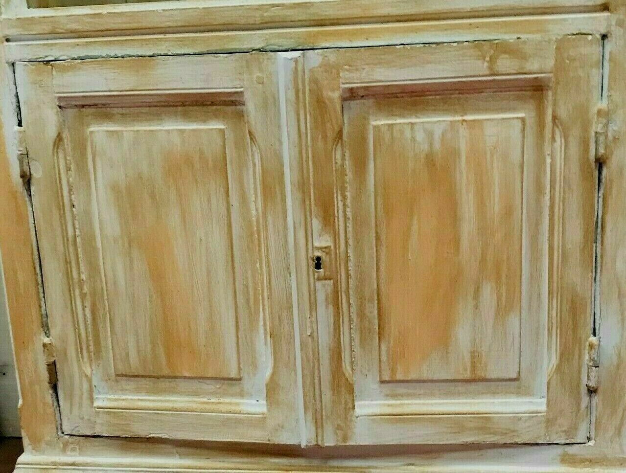 Pair of store windows in patinated fir
