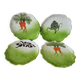 4 hand-decorated earthenware plates with vegetable and green leaf designs.
