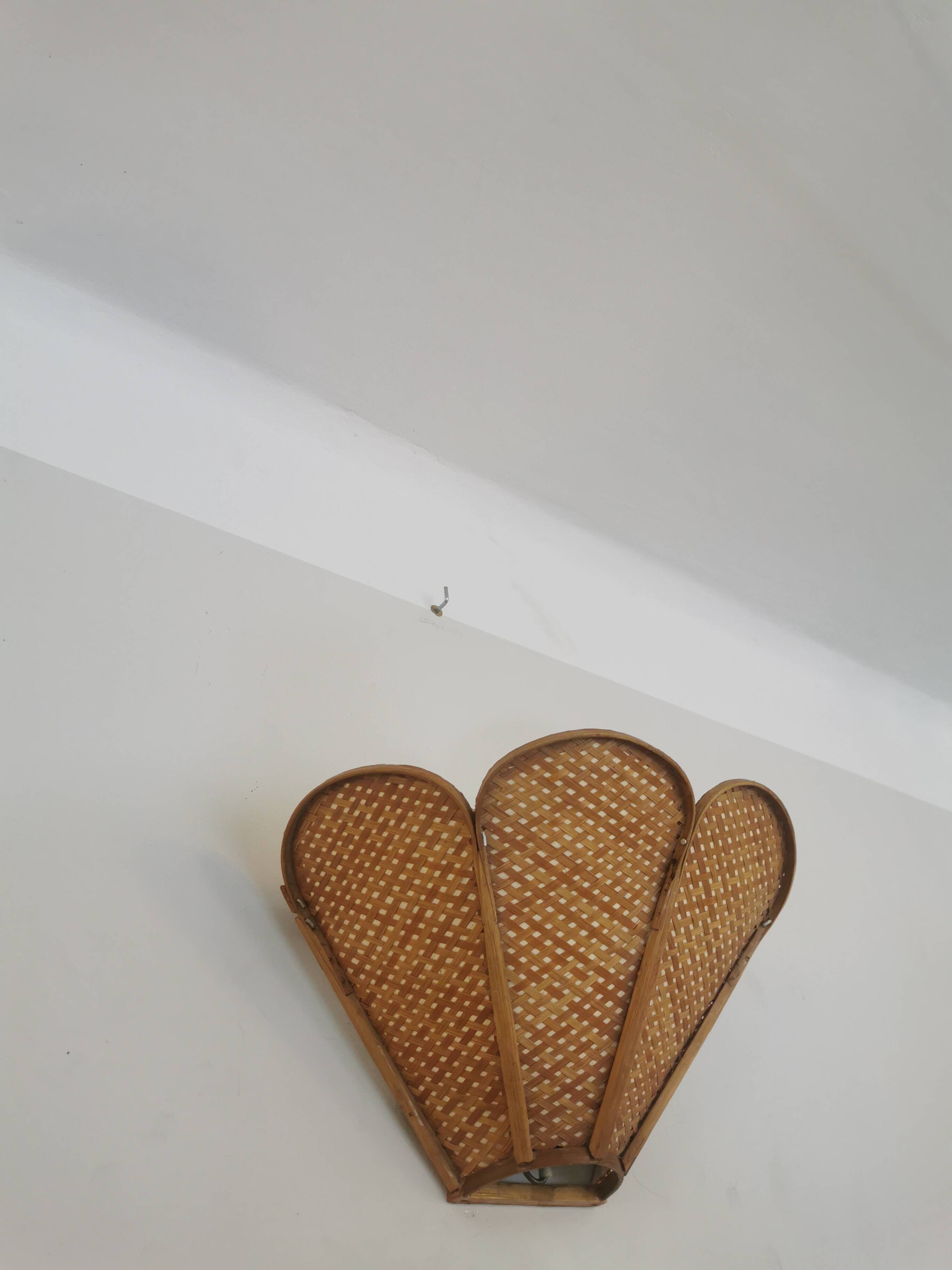 Pair of vintage "tulip" wall lights in rattan and canework