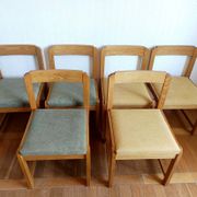 Six Scandinavian style chairs in elm and fabric.