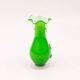 Excentric green blown glass vase with relief flowers Murano