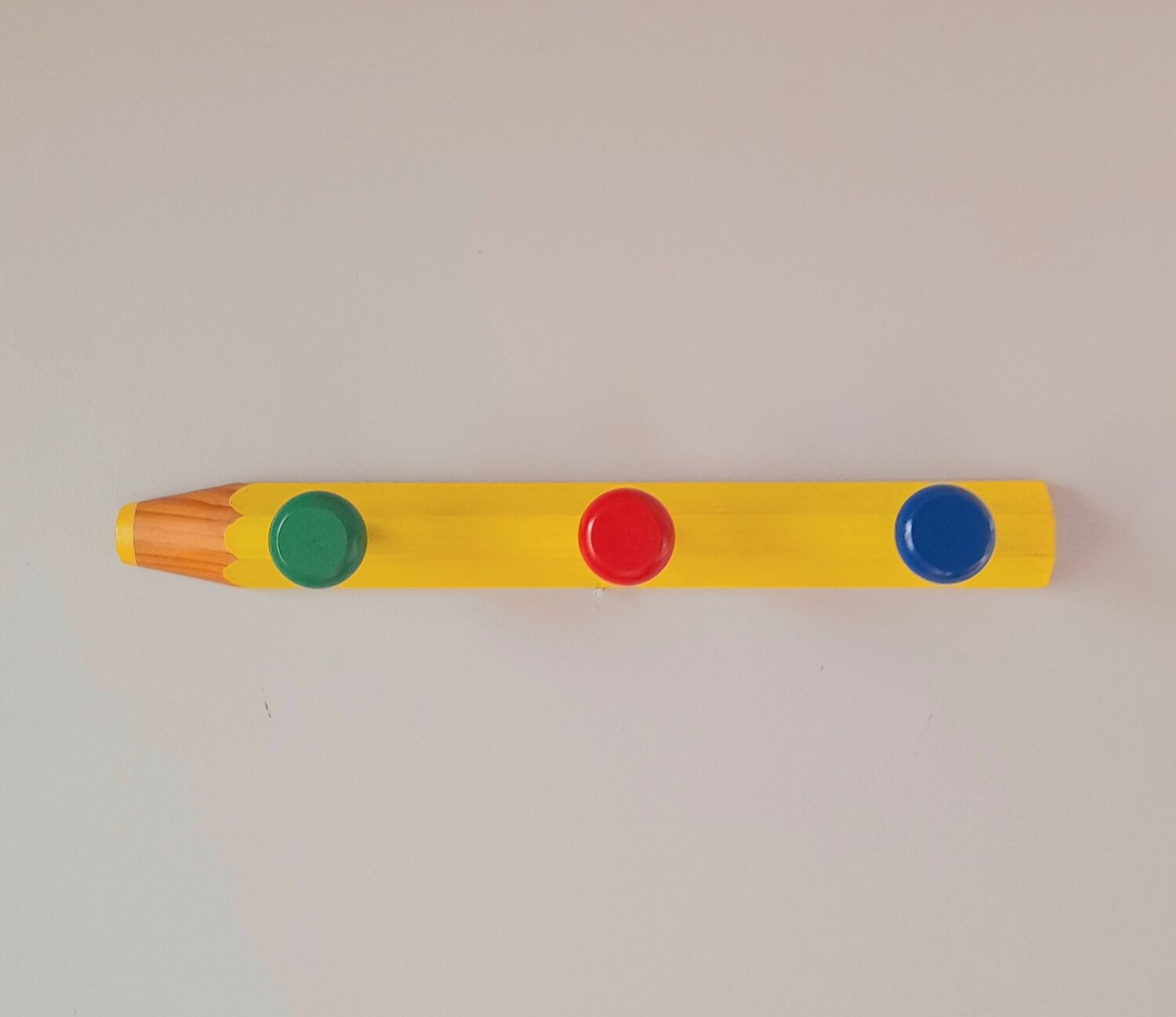 Pencil wall coat rack