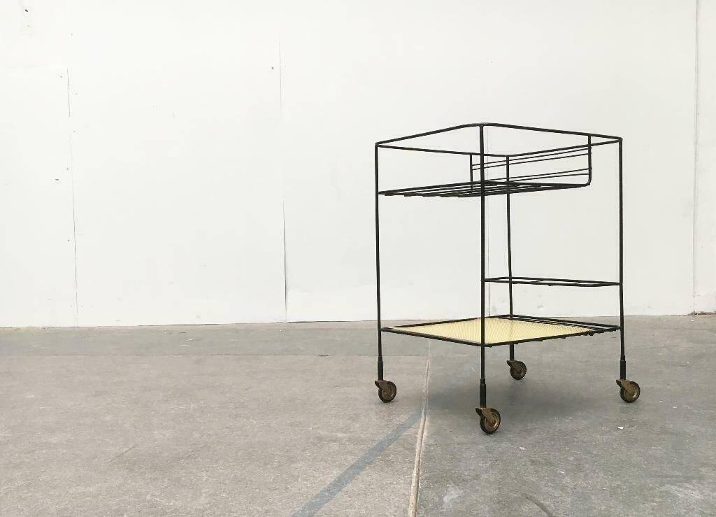 Minimalist perforated metal serving trolley in mid-century style, 1960s.