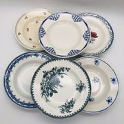 Set of 6 mismatched deep plates.
